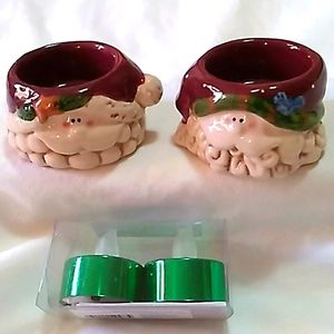 (2) cute whimsical Santa candle holders
